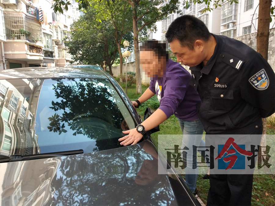 宝马车停他人车库门前被喷漆 广西柳州车主大闹物业公司